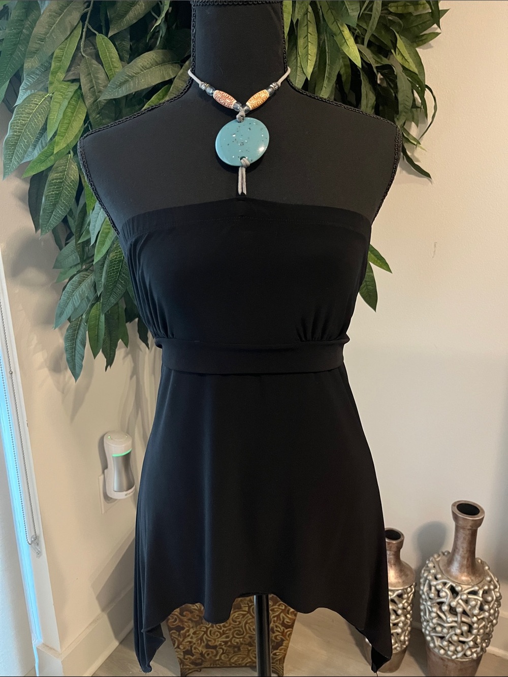 Black Strapless Asymmetric Hem Top